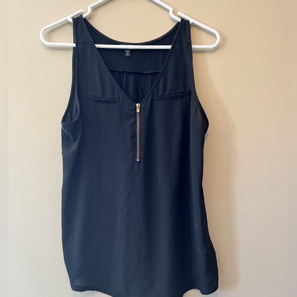 Express black tank with 1/4 zipper and faux pockets in front, pleated back. M - Picture 1 of 3